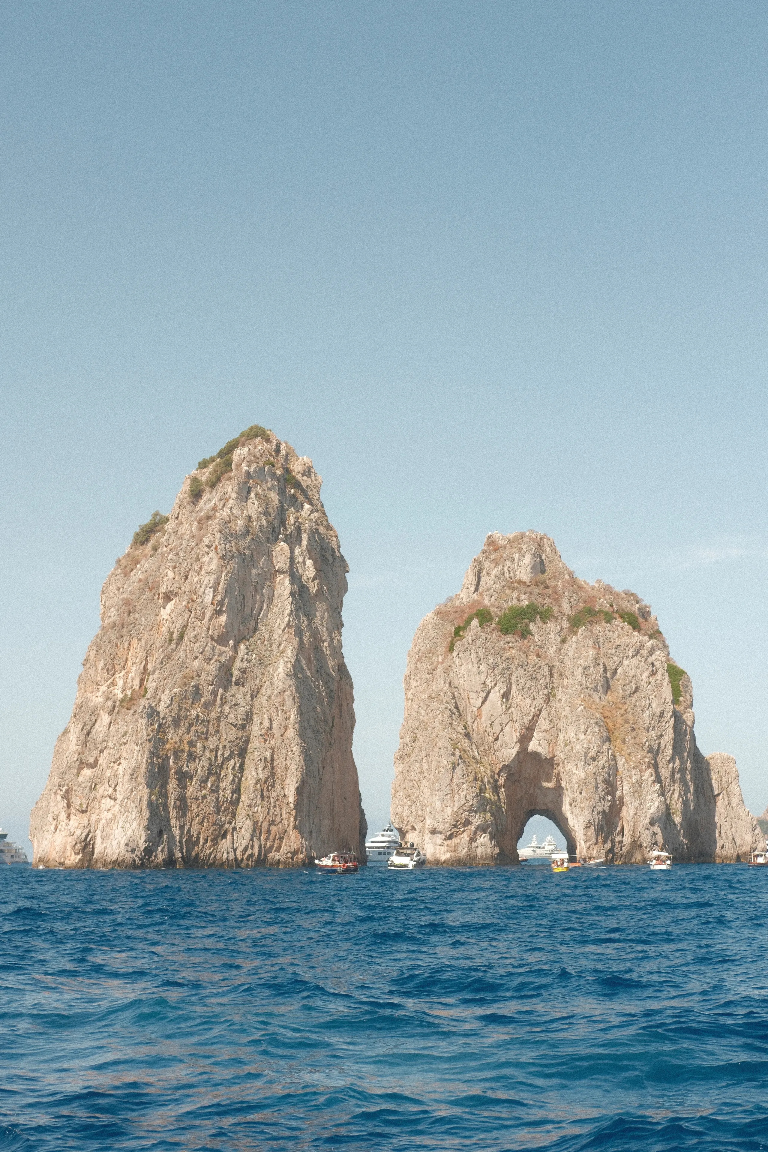 The Faraglioni rocks off Capri rising out of deep blue water