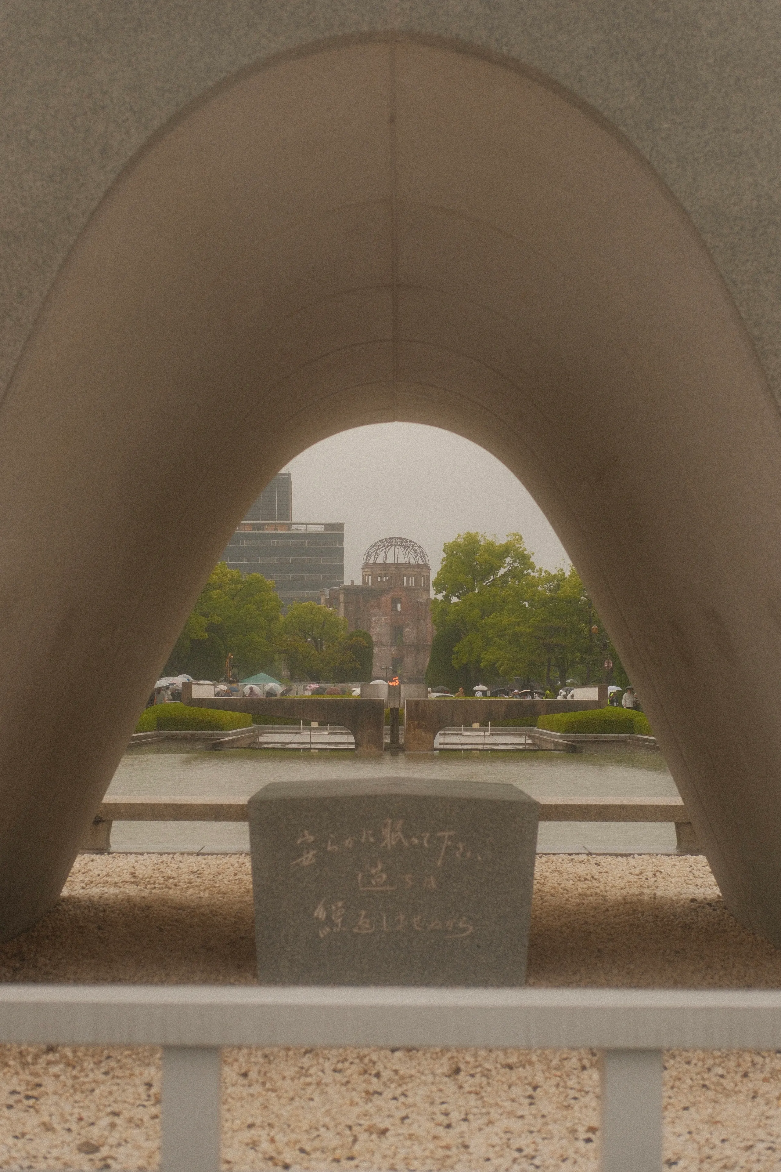 The Atomic Bomb Dome framed by the arch of the Hiroshima cenotaph